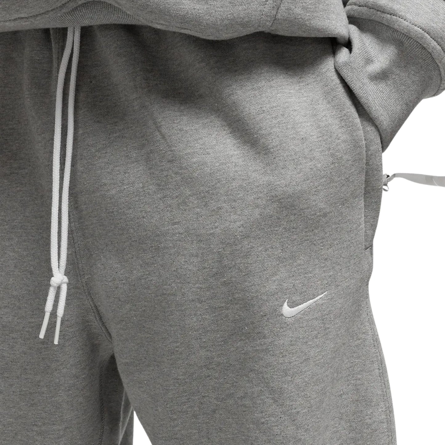 Onesizestore Pantaloni Nike Lab in fleece con bordo aperto Solo Swoosh FN3342 063